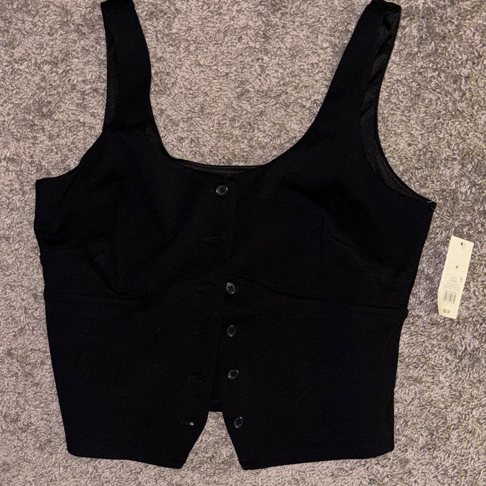 NEW with tags; women’s black vest